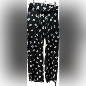 Black pants with white flowers